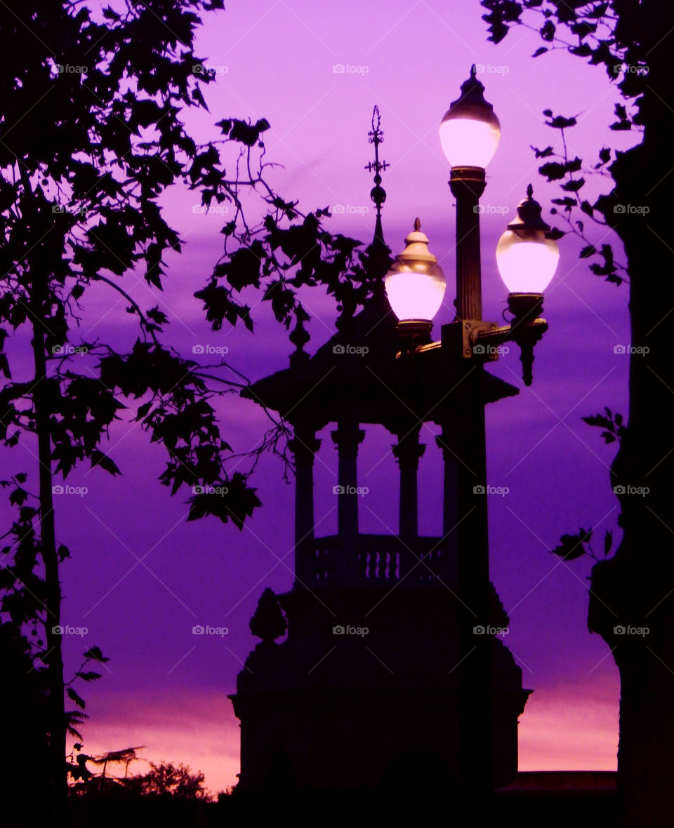 Silhouettes on purple sky