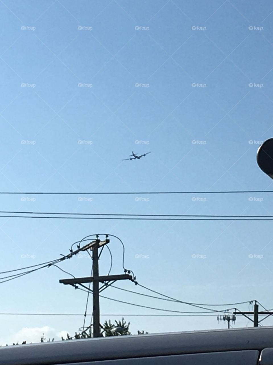 It’s a beautiful day to fly not a cloud in the sky. This was in a nearby town.