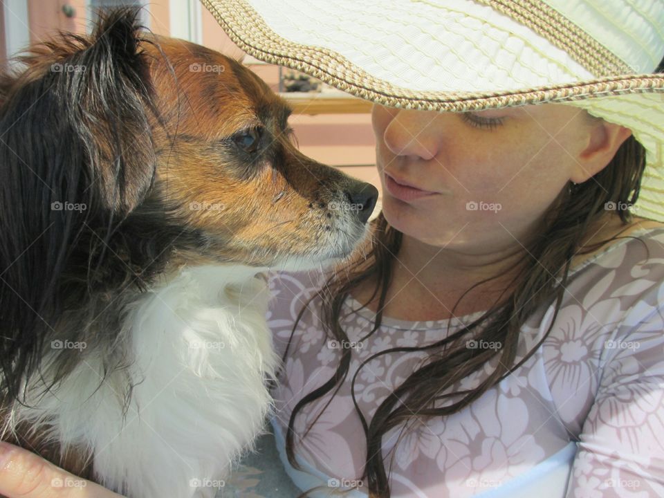 Close-up of a woman with dog