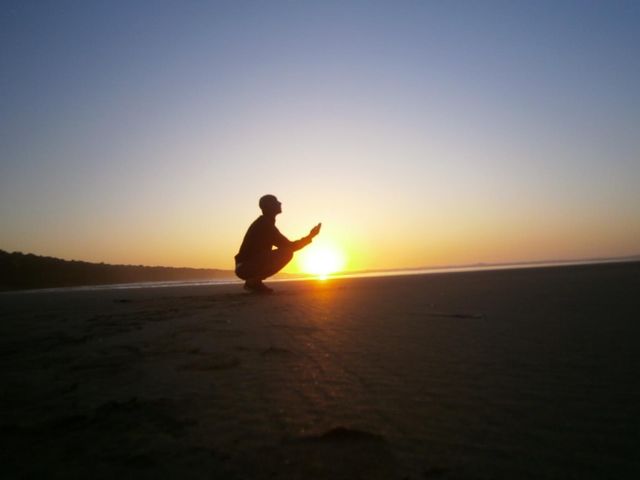 Sunset Crossing fingers 