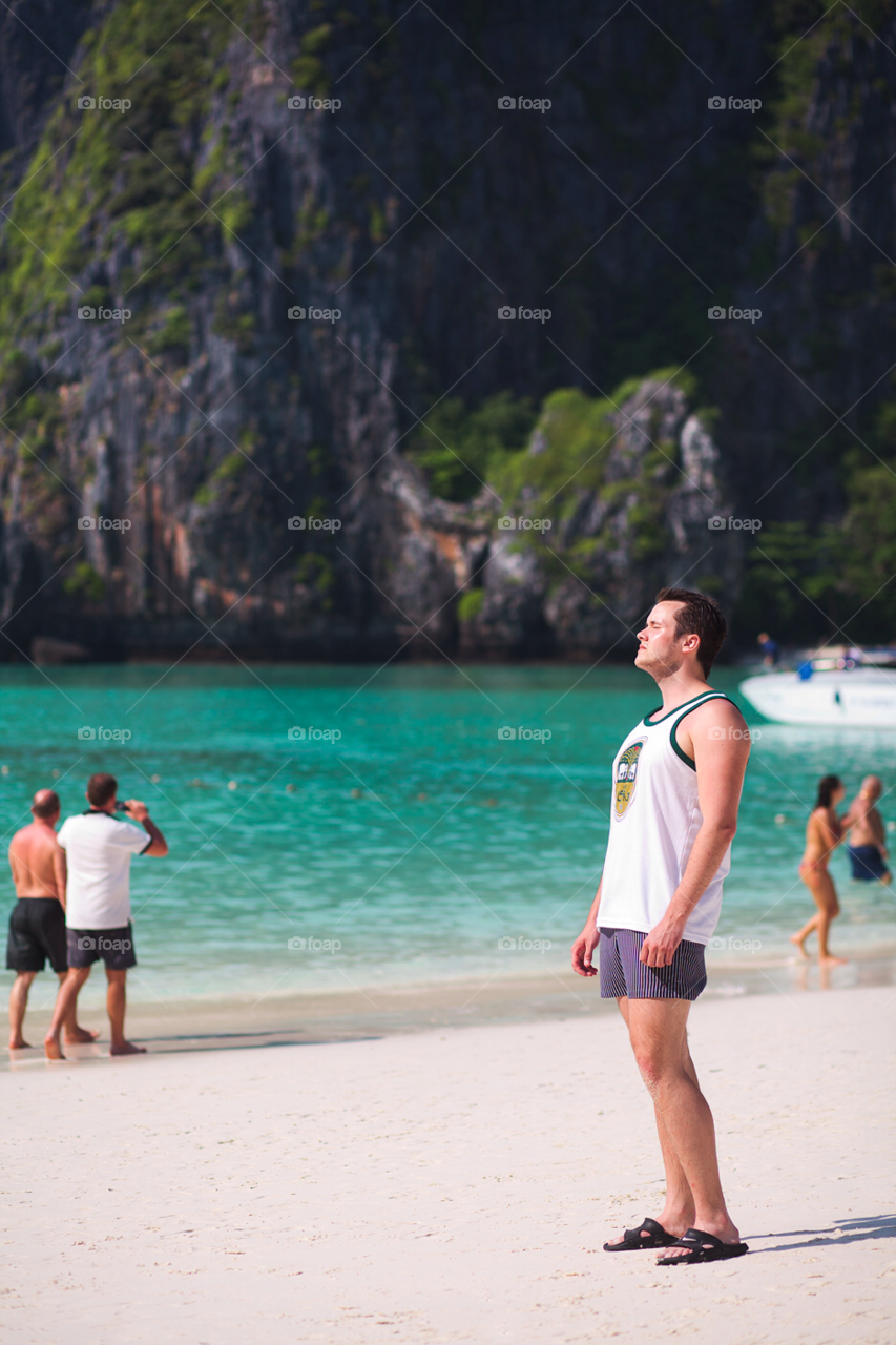 beach ocean sun man by comonline