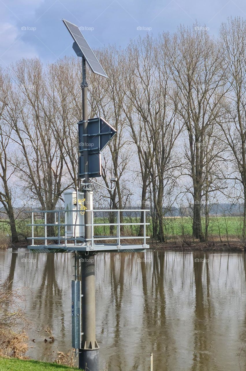 Architecture of a solar powered traffic sign of a waterway