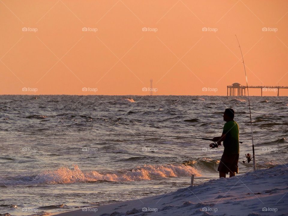 Sunset fisherman