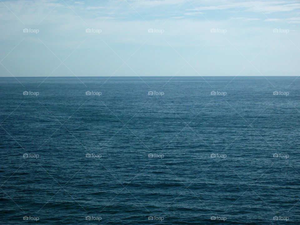 A linha azul do horizonte infinito.