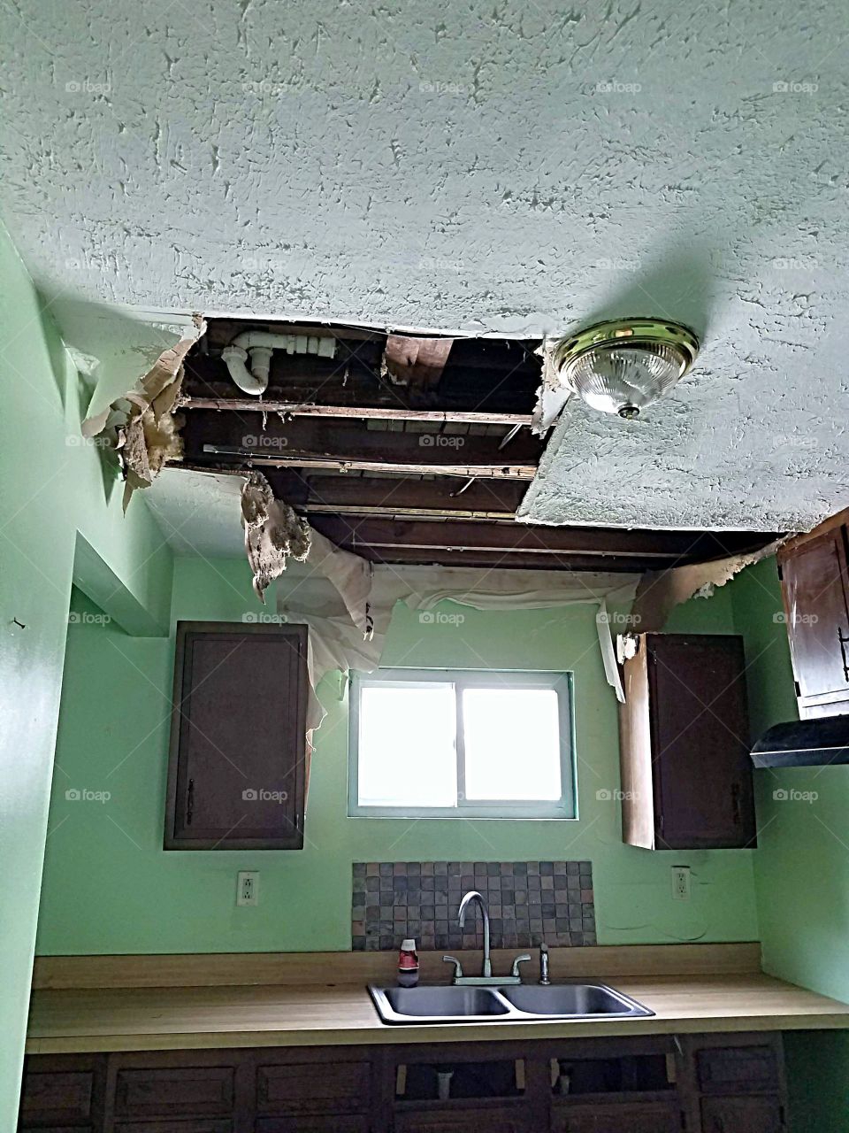 ceiling damage in a kitchen