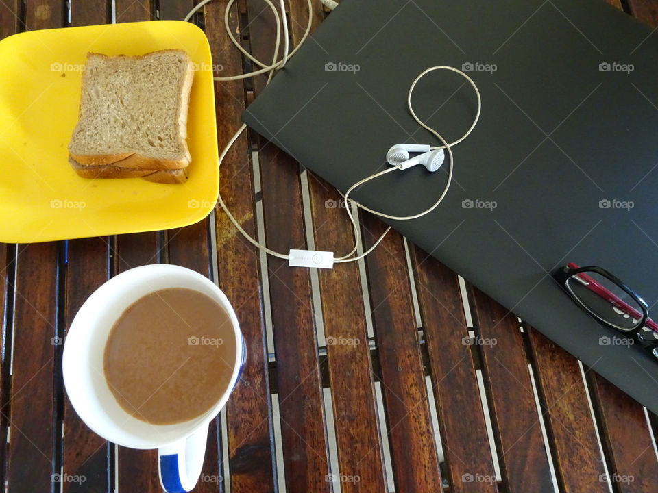 getting started with the day with cup of tea and toast