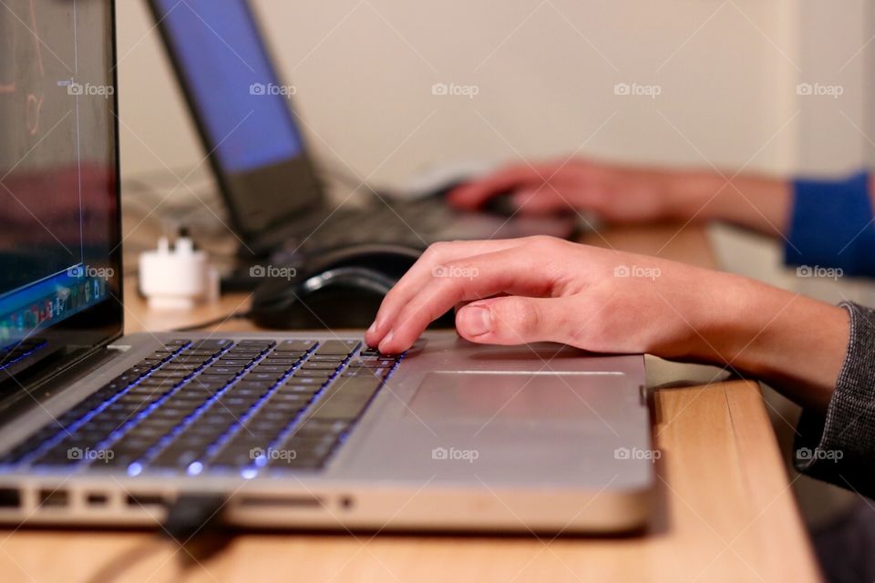 Hands on laptop