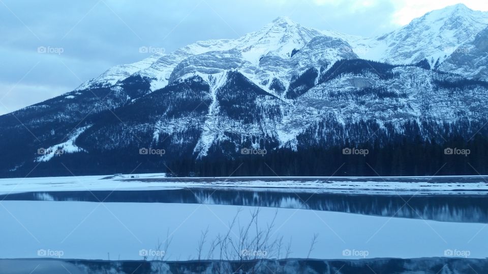 Frozen Lake With Mountains