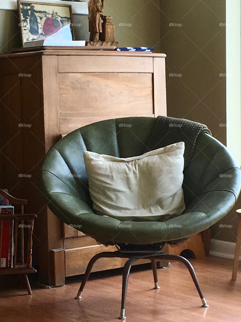 1960s furniture: olive green vinyl leather look papasan chair