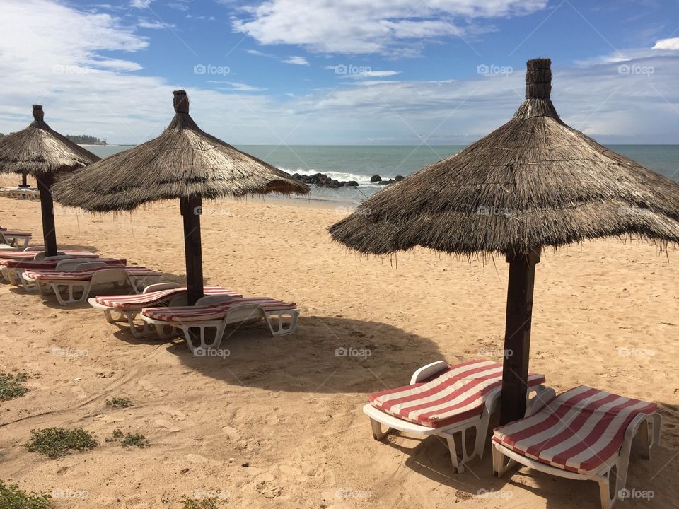 Umbrellas on an empty beach