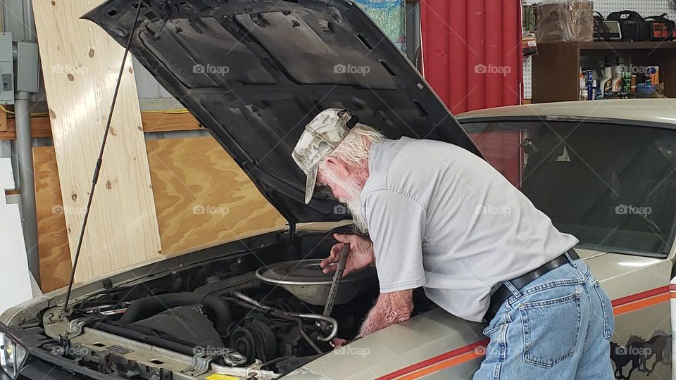 Working on a 1979 Ford Mustang Indianapolis 500 Pace Car. Some work is just a joy to some people.