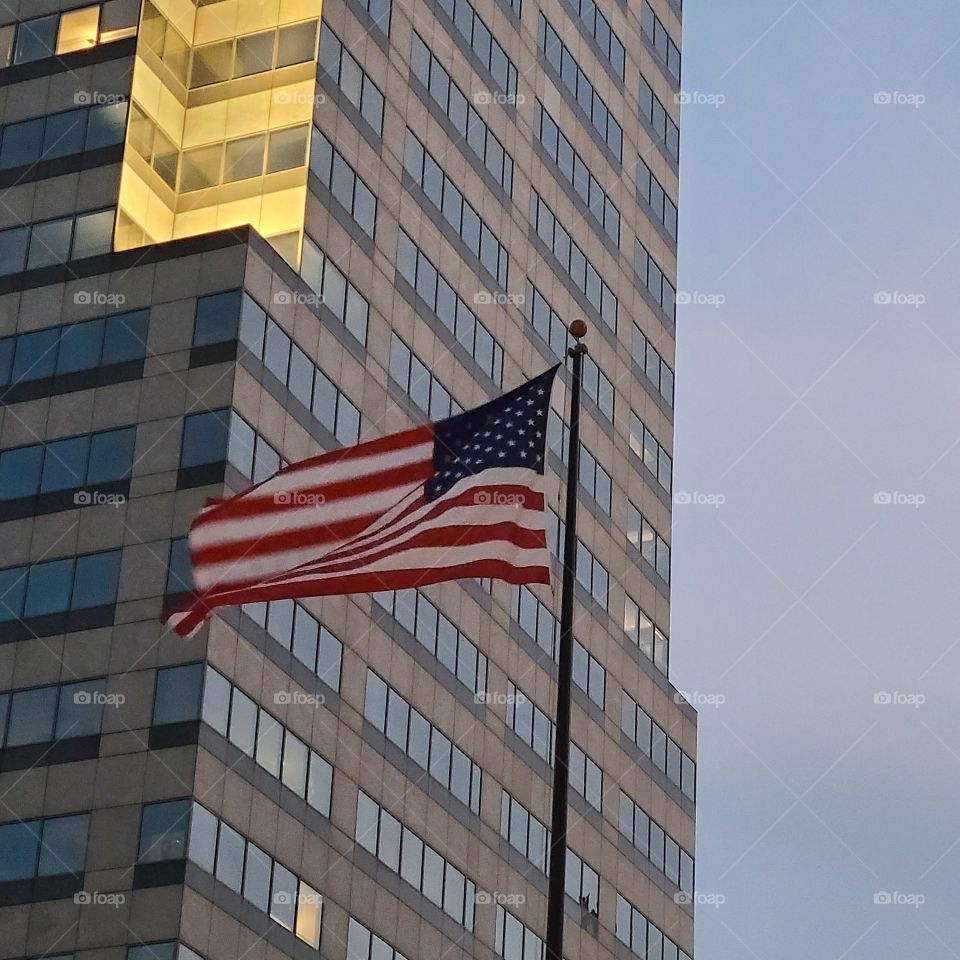 American flag blowing in the wind over Indy