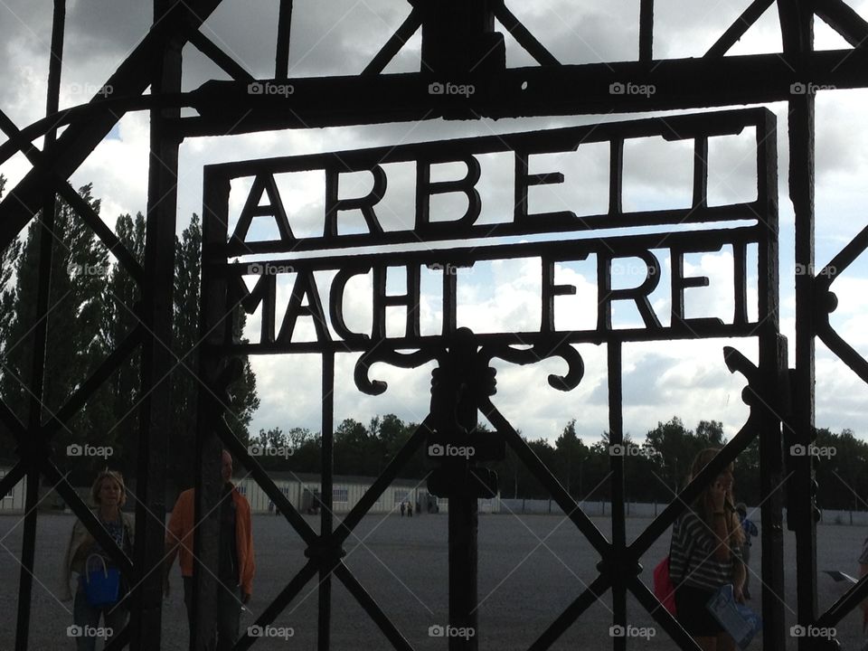 The sign, reading "work will set you free", marking the entrance to Dachau concentration camp in southern Germany.