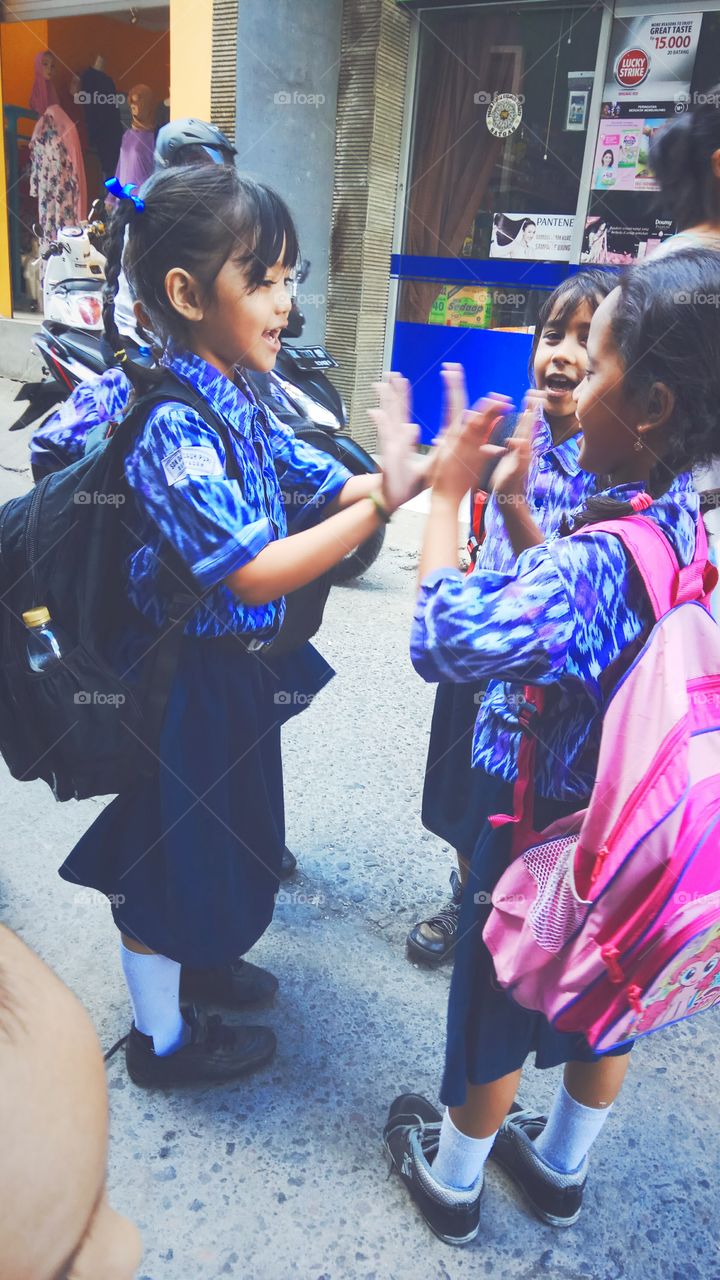 Girl playing with each other