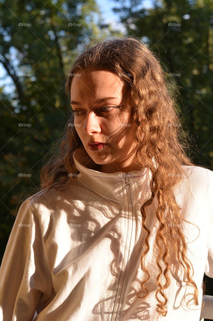 young girl beautiful portrait in sunlight
