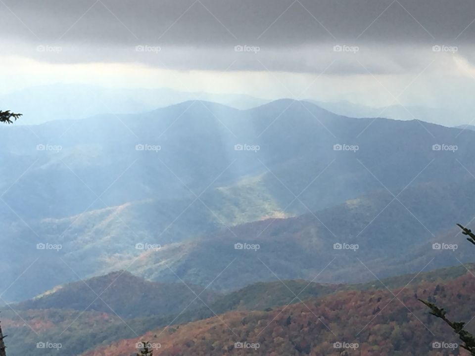 The Beams Of Light Rain Down Upon Us