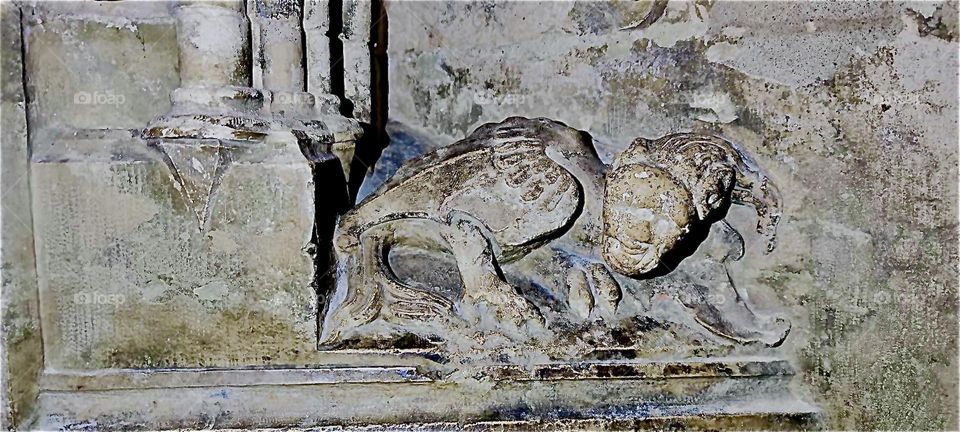 Two symmetrical marble reliefs facing each other are placed along the side isle inside the cathedral in the beautiful town of “Regensburg”, “Oberpfalz” in Germany. 2023. Hypnotic Productions