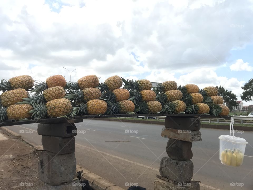 Pineapples ready for sale .best pineapples in Kenya and also best for export .photo taken on a busy superhighway by me and my friends