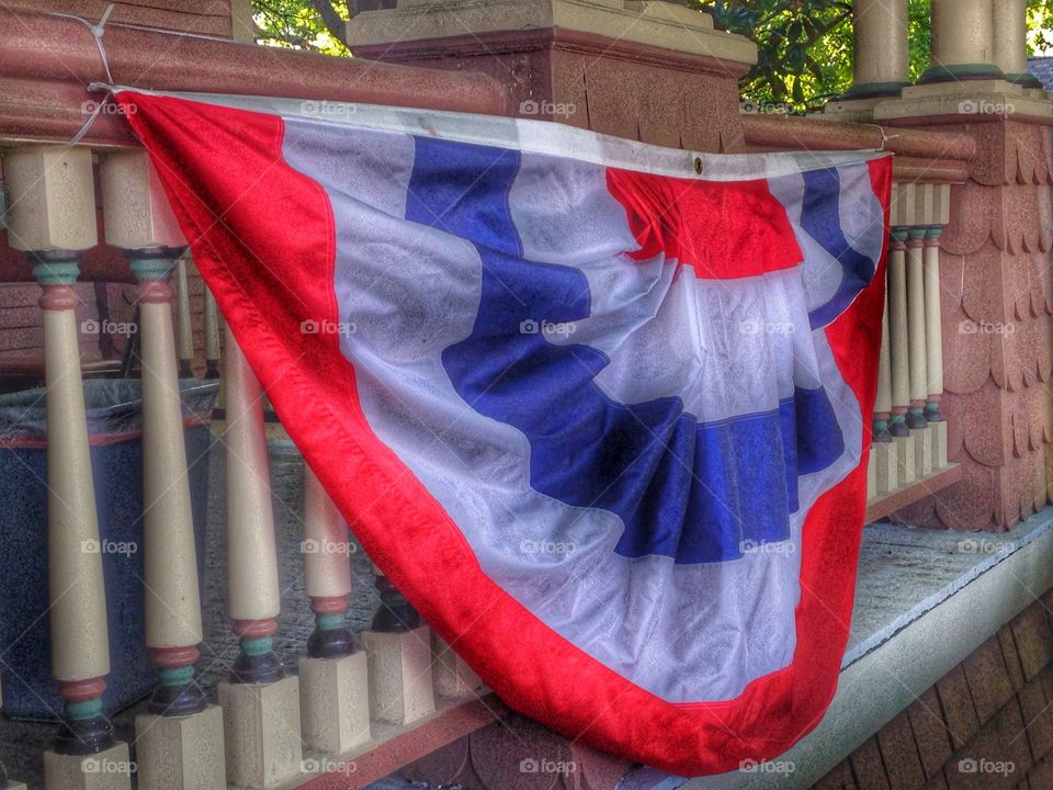 Day of patriotism . Patriotic decor on historical home