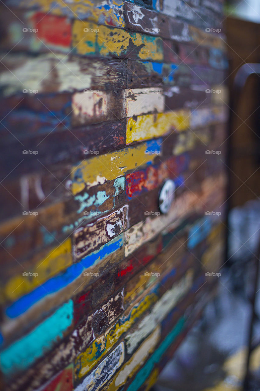 patchwork of colorful wooden pieces close up texture