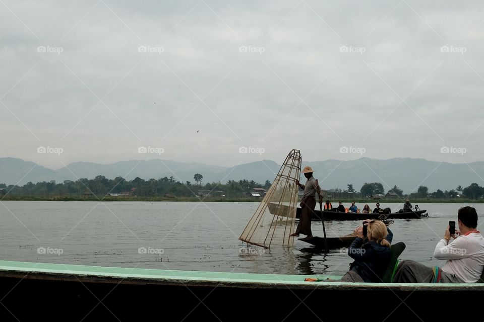 Tourists watching fishing