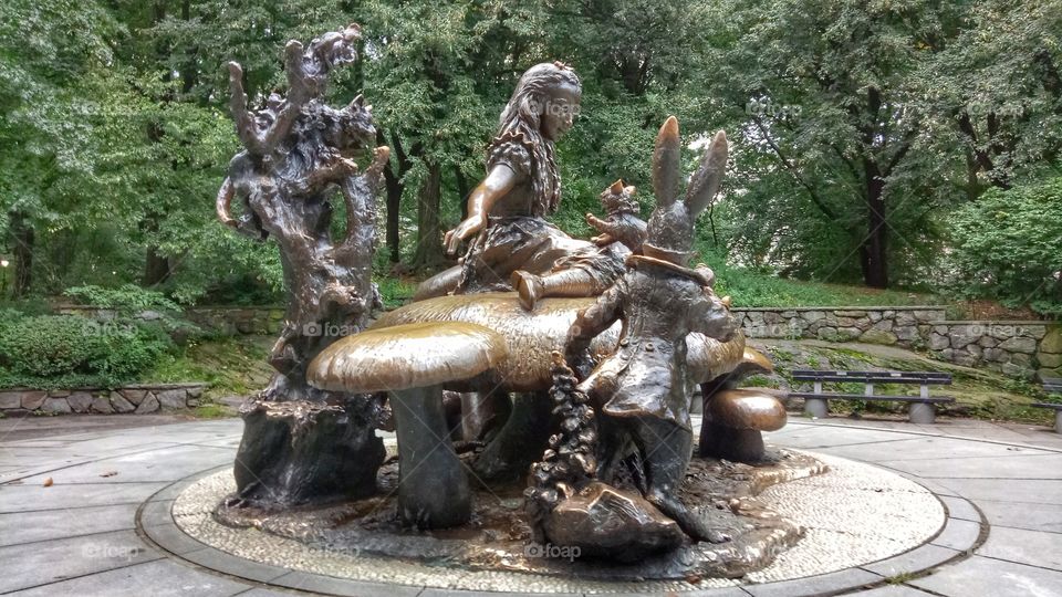 Statue, sculpture of Alice in wonderland in Central Park New York. Loving, gentle and trustful. 