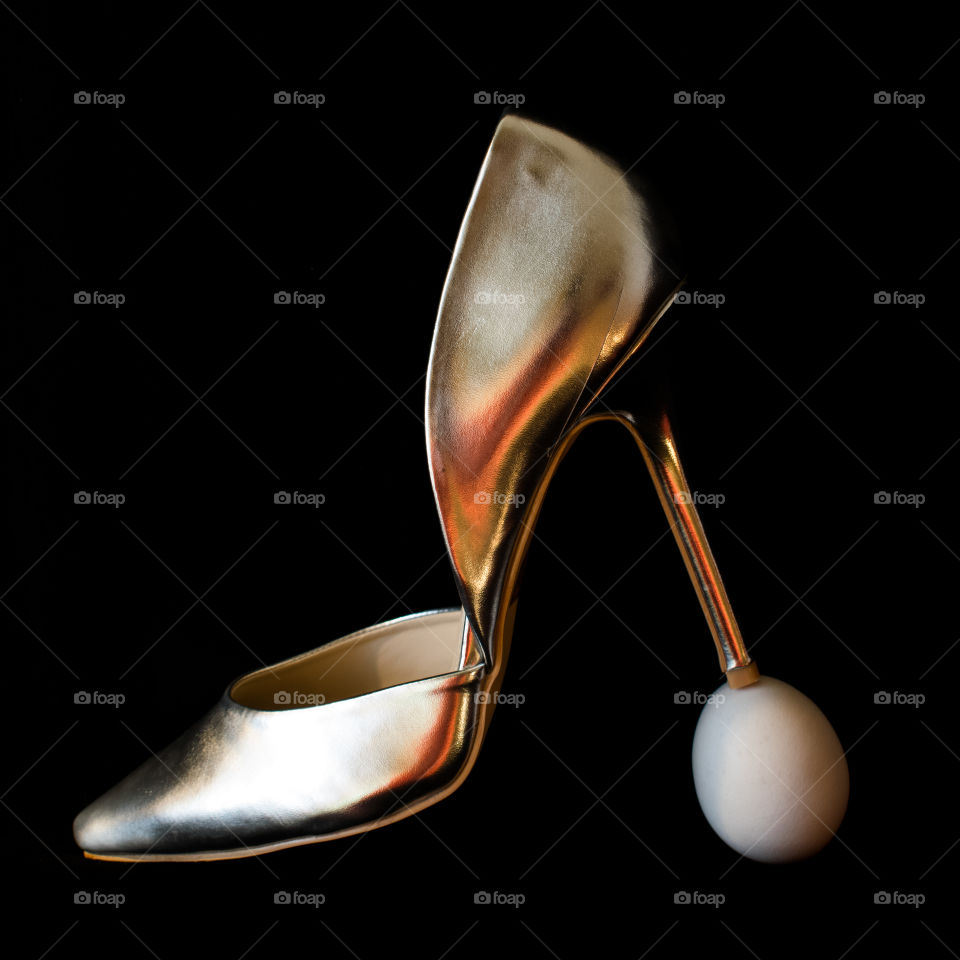 Shoe and egg
