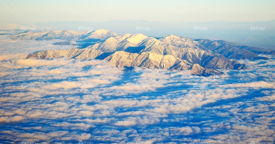 cloud island. mountain above the clouds