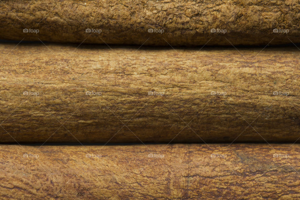 cinnamon sticks macro background texture