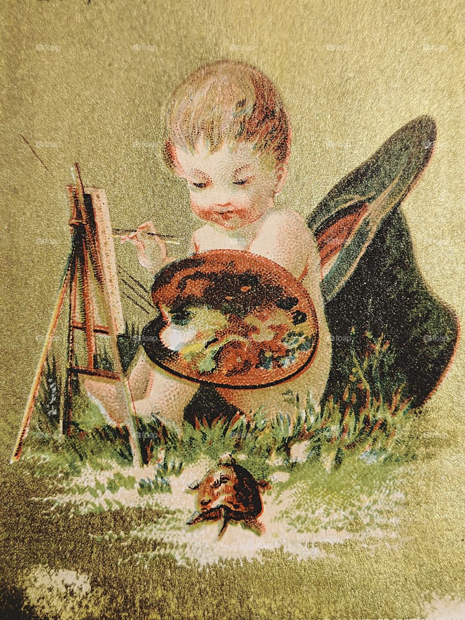 Victorian trade cards with baby looking at a turtle while painting in front of a big hat.