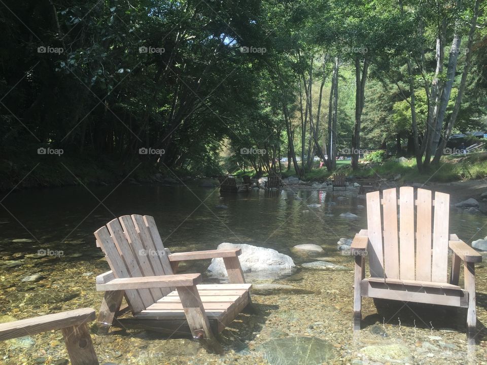 Chairs in a Creek