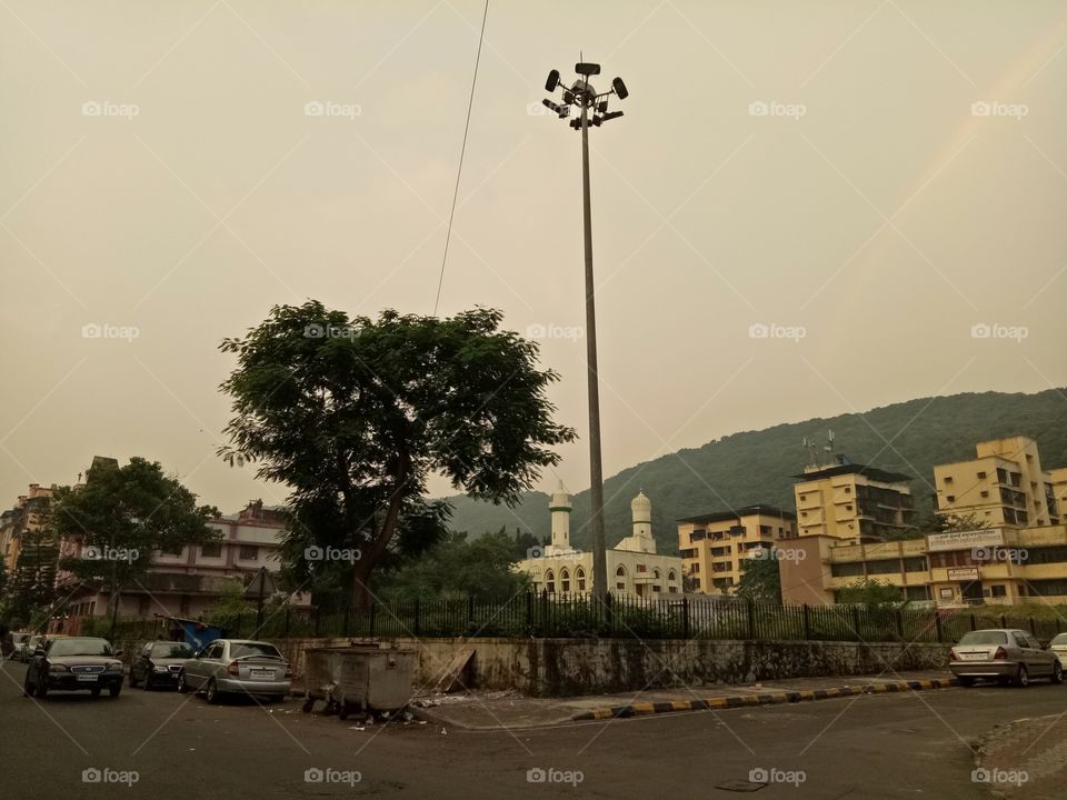 building tree lightlamp abd Moutain. and rainbows