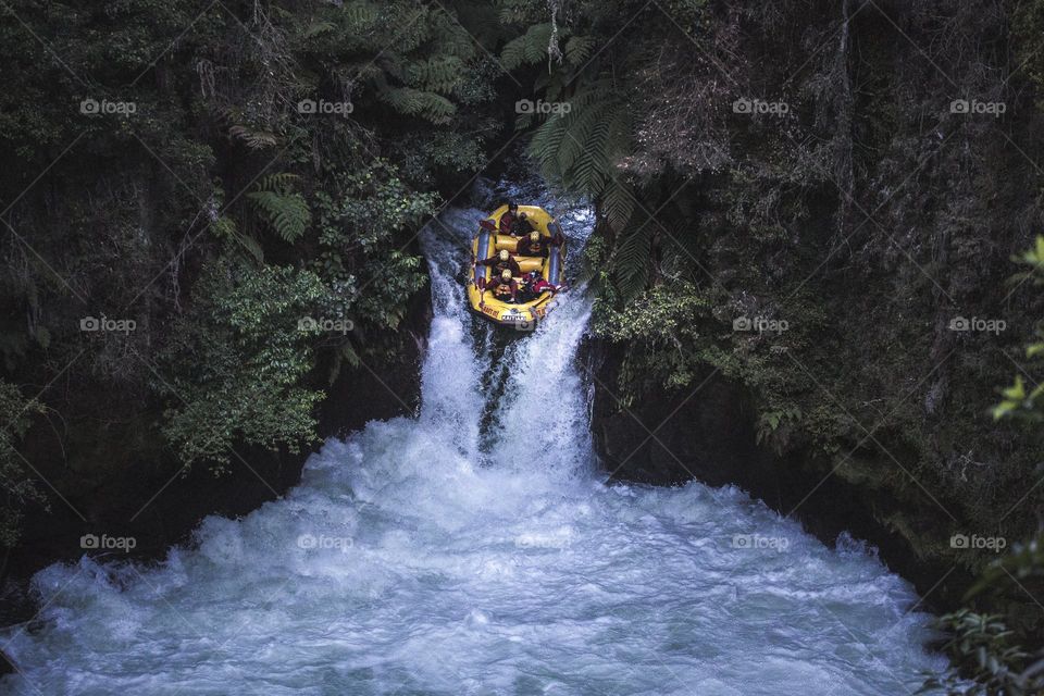 raft-going-down-whitewater-rapids