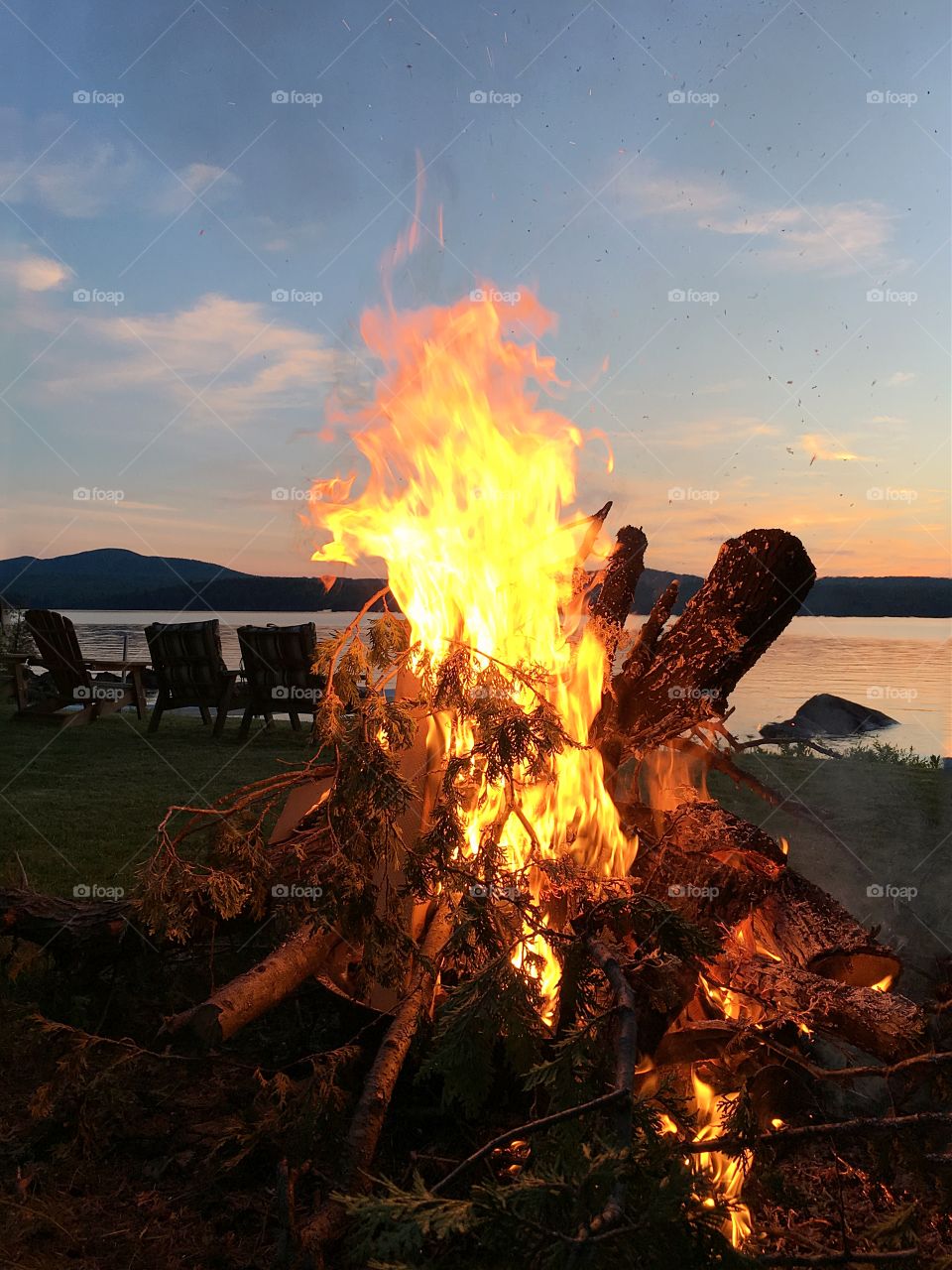 Bonfire at the lake in the Adirondack mountains