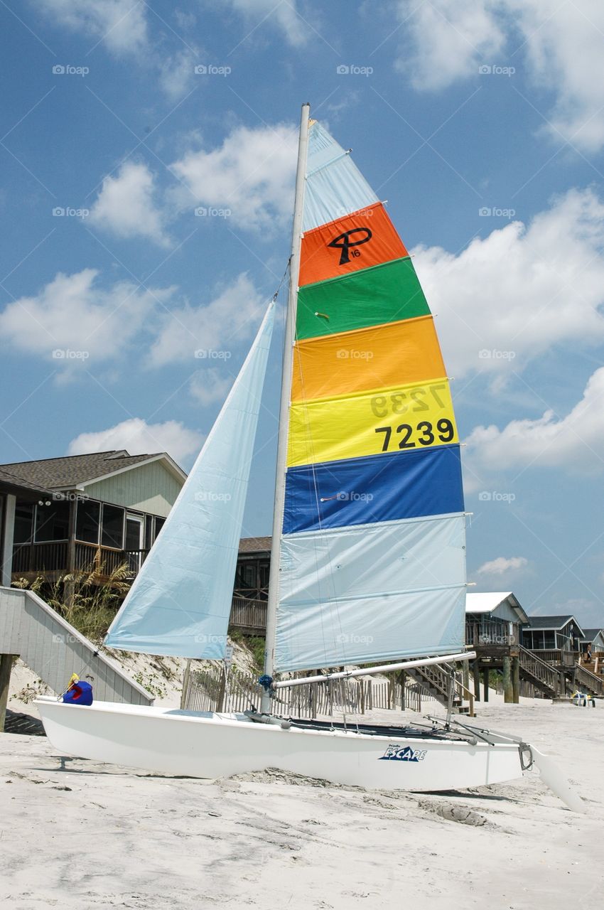 Sail boat. Sailboat sitting on the sand at Pwaleys Island South Carolina