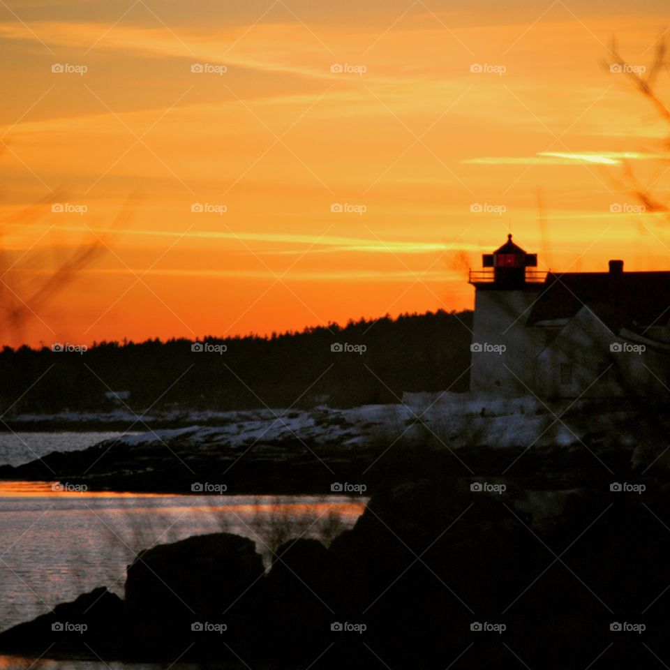 Sunset and a light house off the coast of Maine. How could you ask for anything else. 