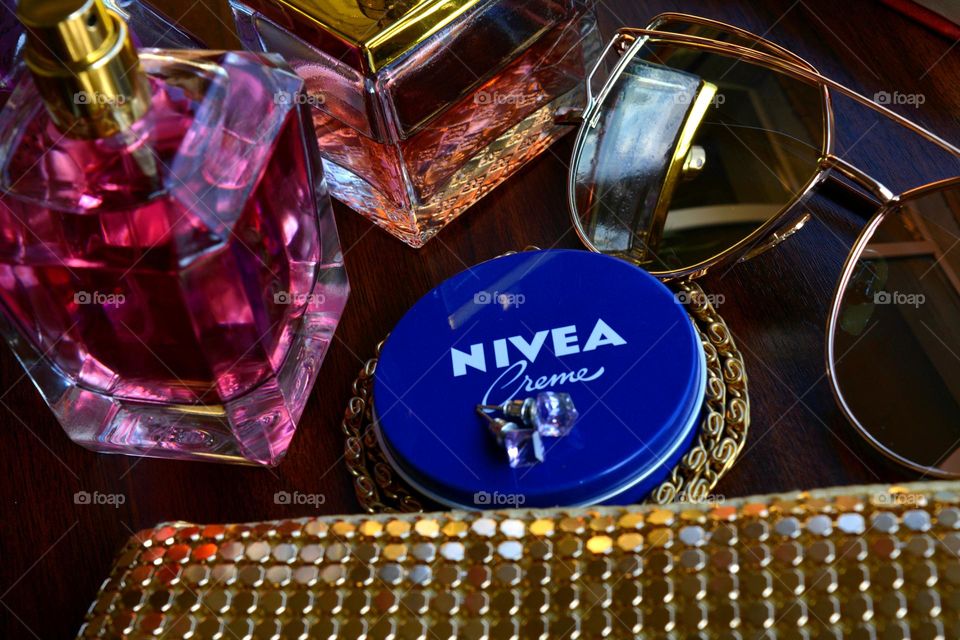 woman accessories and Nivea cream