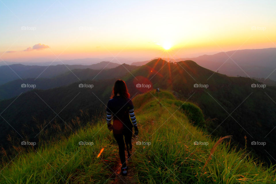 standing with sunset