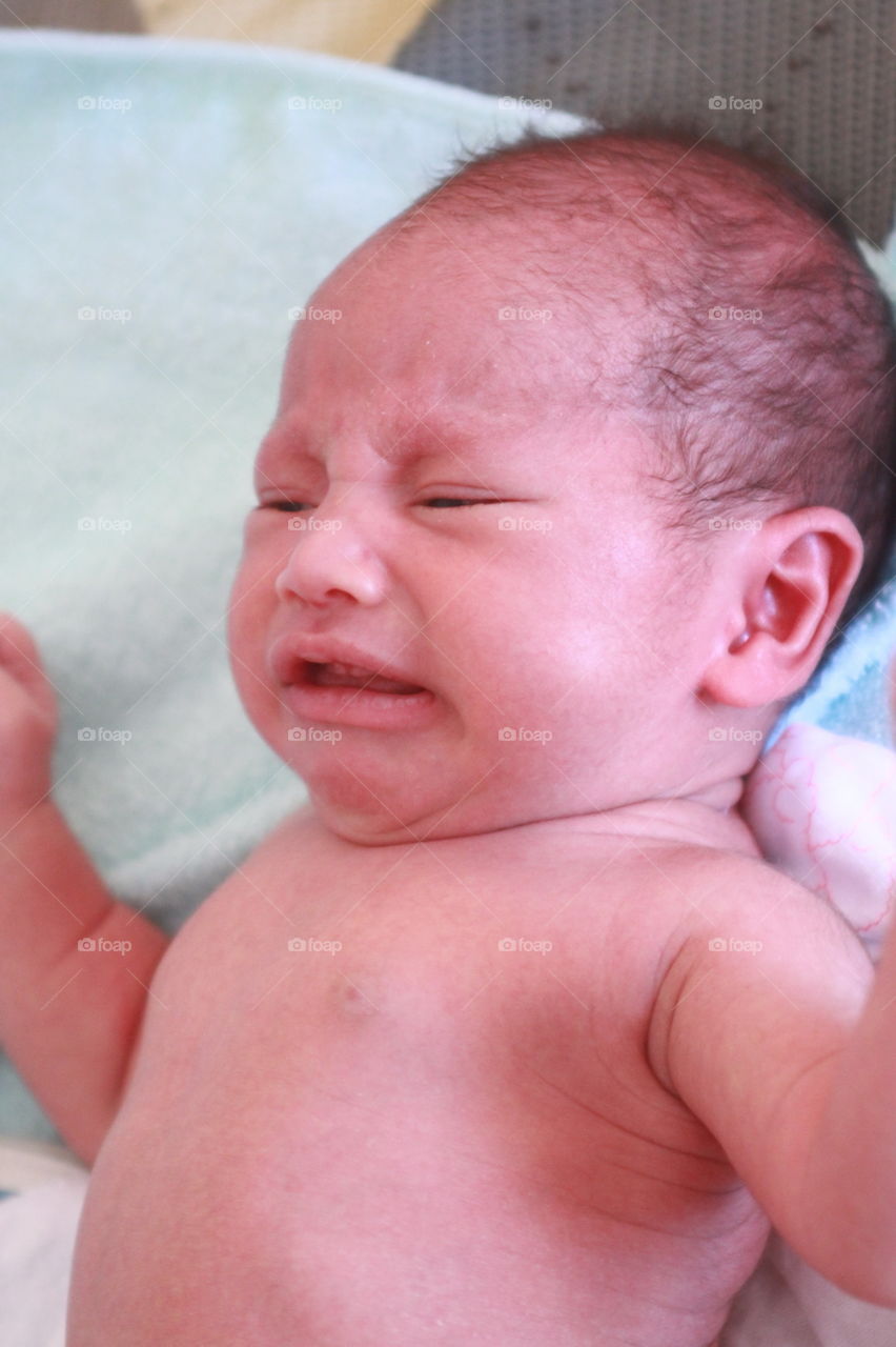 Newborn baby crying. first minutes of life