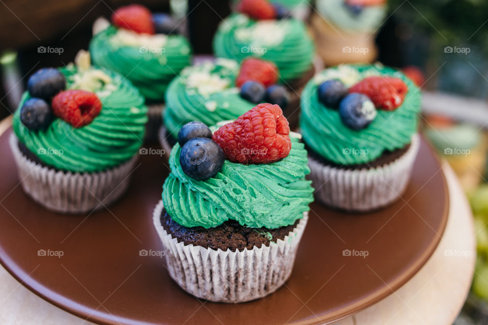 Chocolate cupcakes with green cream
