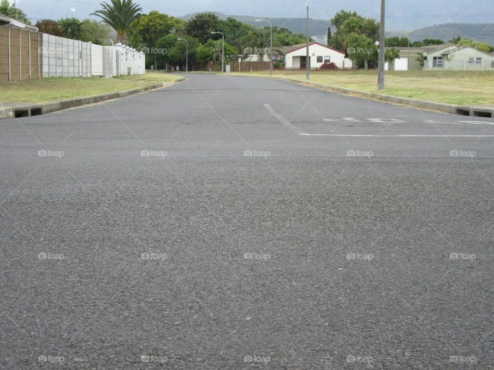 Tar roadside in town