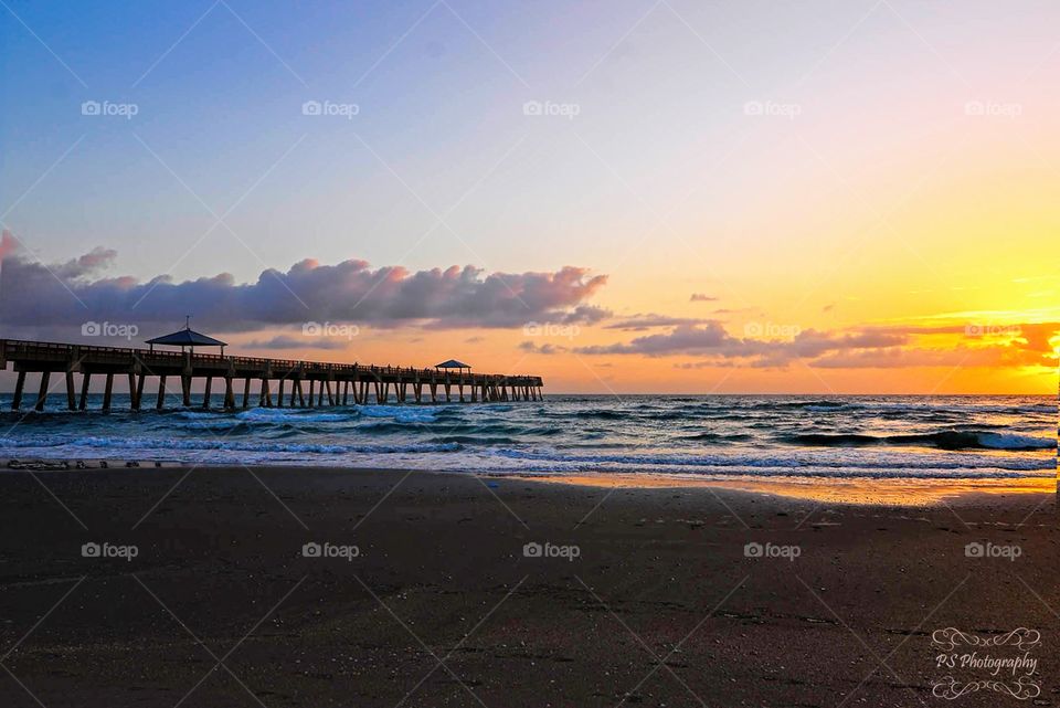 Juno Beach pier sunrise