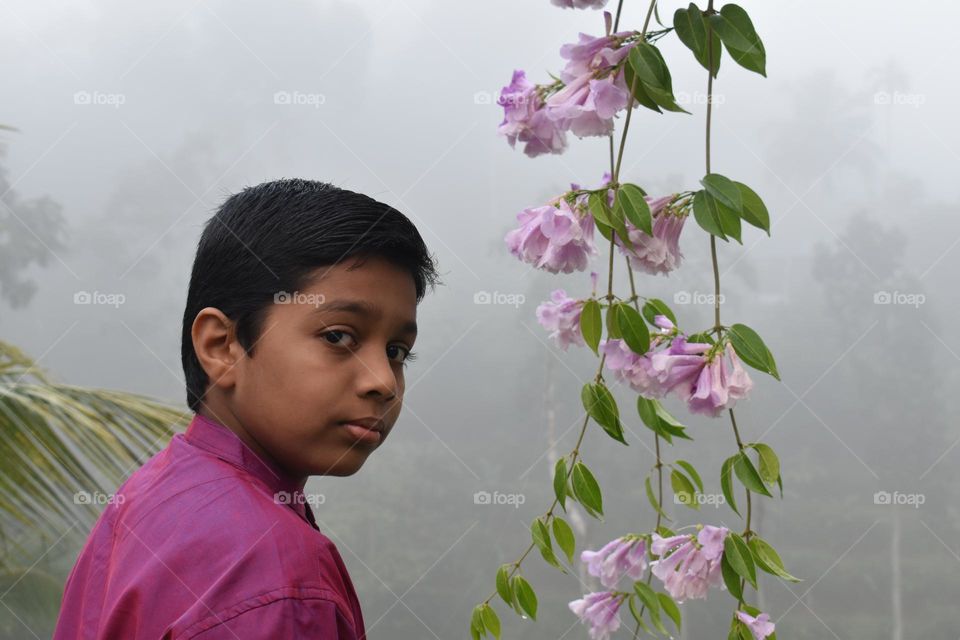 foggy weather and the teenager looking at the camera