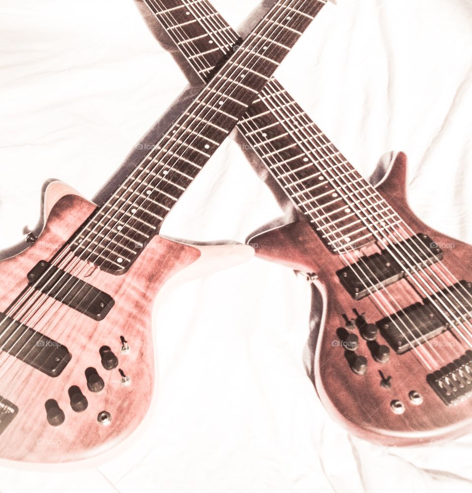 Crossed war guitars 