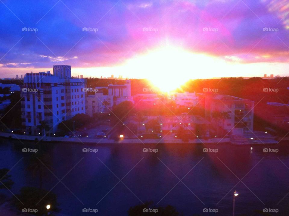Colorful Sunset in Miami Beach. Taken on the 12th story of a high rise on Collins Ave. in Miami Beach, Florida, facing the city.