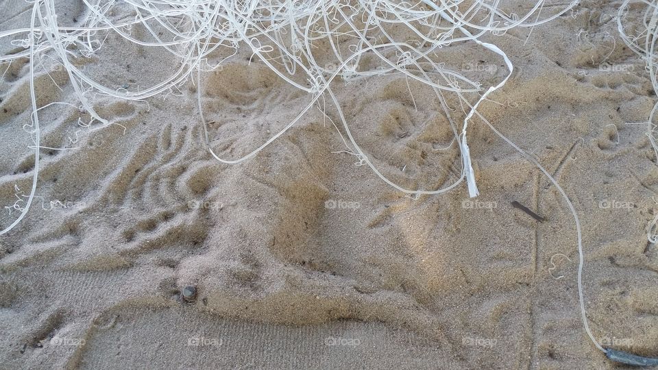 rede de pesca na areia