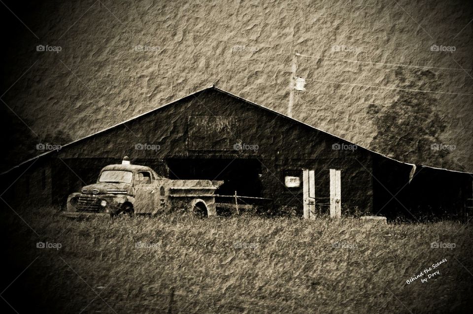 Old truck by barn
