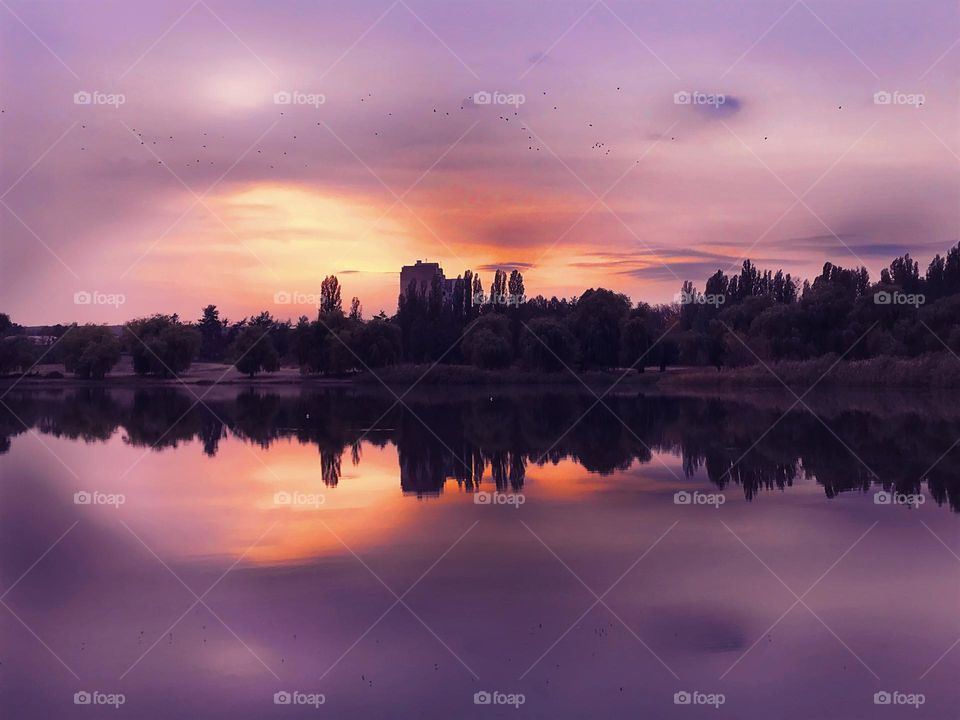 Evening sky over the city riverside 