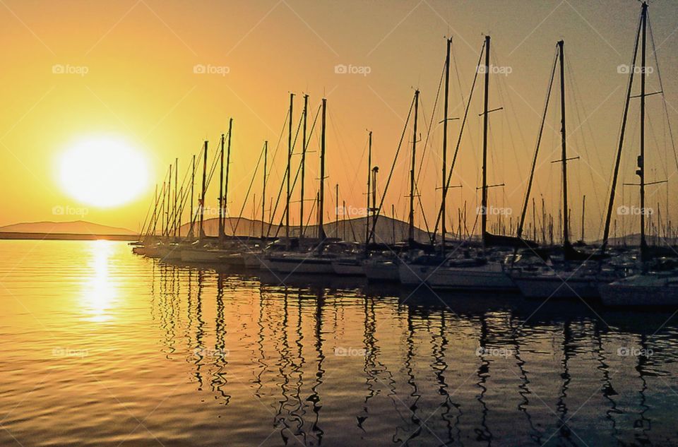 sunset reflection over boat