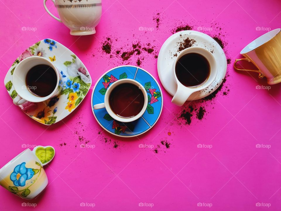 cups of coffee all different and colored shot from above